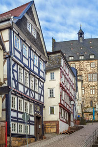 Street with half-timbered houses in marburg , germany