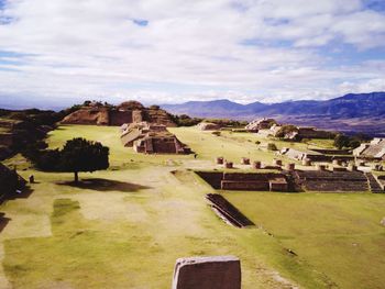 View of cemetery against cloudy sky