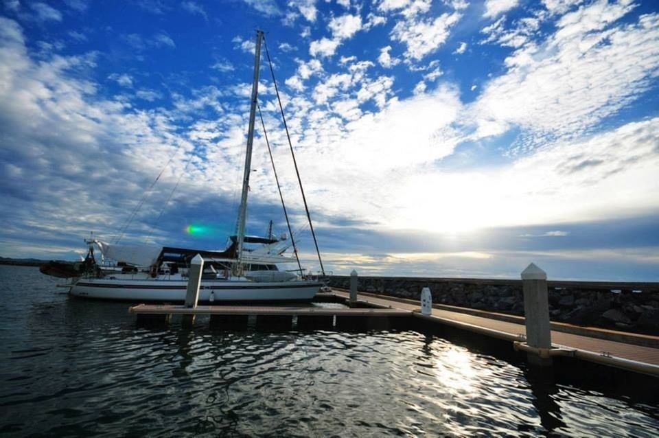 water, transportation, nautical vessel, sky, sea, mode of transport, boat, cloud - sky, moored, cloud, tranquility, tranquil scene, scenics, sunlight, mast, nature, beauty in nature, waterfront, sun, reflection