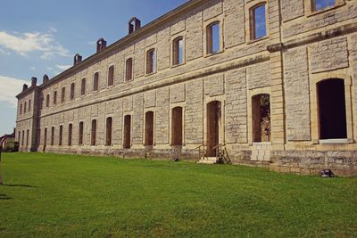 Low angle view of old building against sky