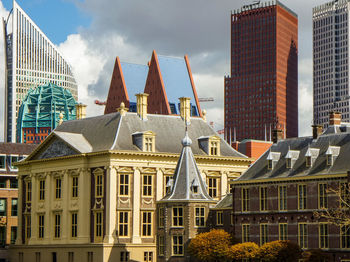 Low angle view of skyscrapers against sky