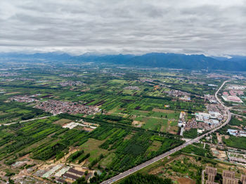 High angle view of agricultural field against sky