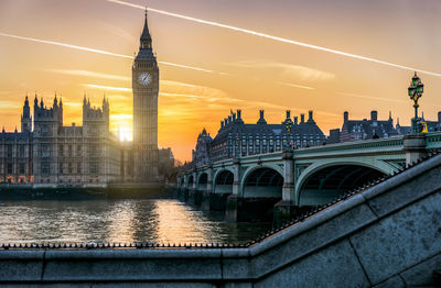 View of bridge over river in city