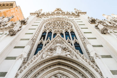 Low angle view of temple against building