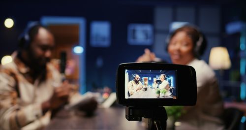 Rear view of woman using mobile phone