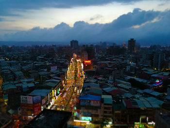 View of city against cloudy sky