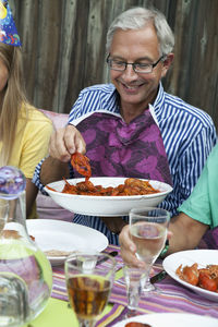 Smiling man at crayfish party, sweden