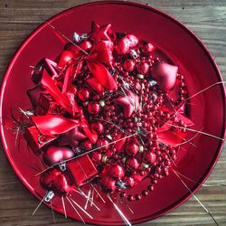 High angle view of red berries in bowl