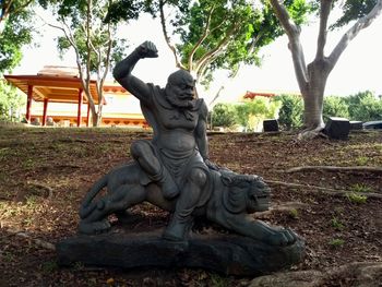 Statue of angel in park