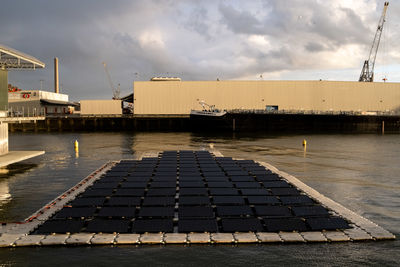 Scenic view of pier by sea against sky