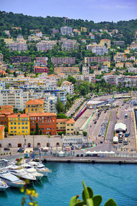 High angle view of townscape and harbor in city