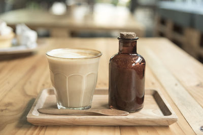 Close-up of coffee served on table