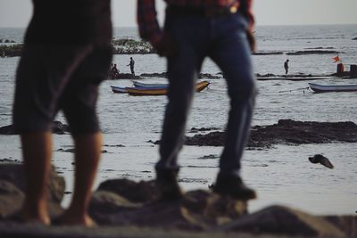 Low section of people on beach