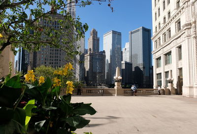 Modern buildings in city against sky