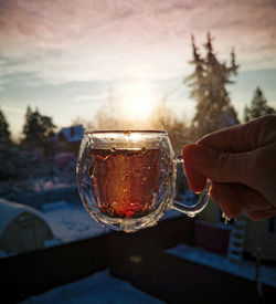 Close-up of hand holding wine glass