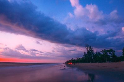 Scenic view of sea against sky at sunset