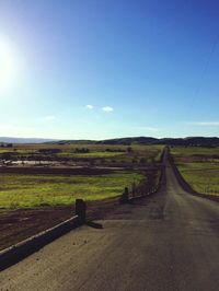 Scenic view of landscape against clear blue sky