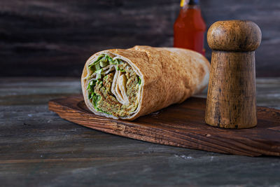 Close-up of bread on cutting board