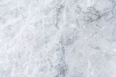 Full frame shot of snow on rock