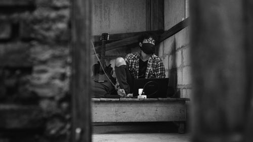 People sitting on table by window