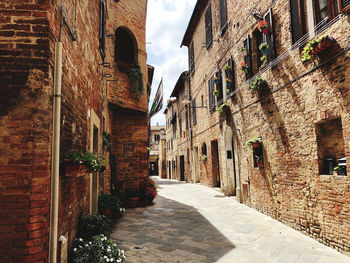 Narrow alley along buildings