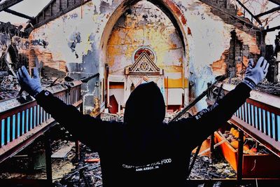 Rear view of woman at temple