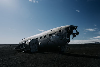 Low angle view of airplane against sky