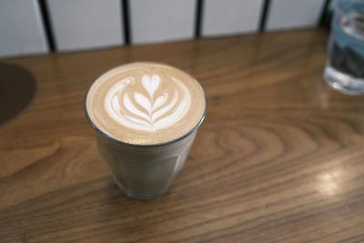 Close-up of cappuccino on table