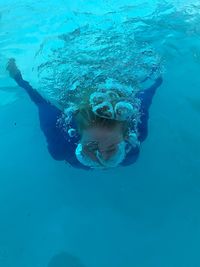 Woman swimming in sea