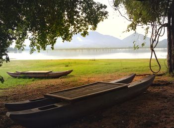 Empty bench on lakeshore