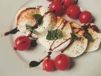 High angle view of cherry tomatoes in plate