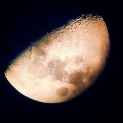 Close-up of moon over black background