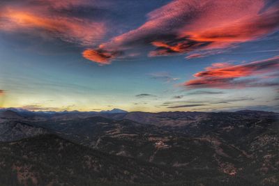 Scenic view of dramatic sky over landscape