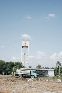 Construction site on field against sky