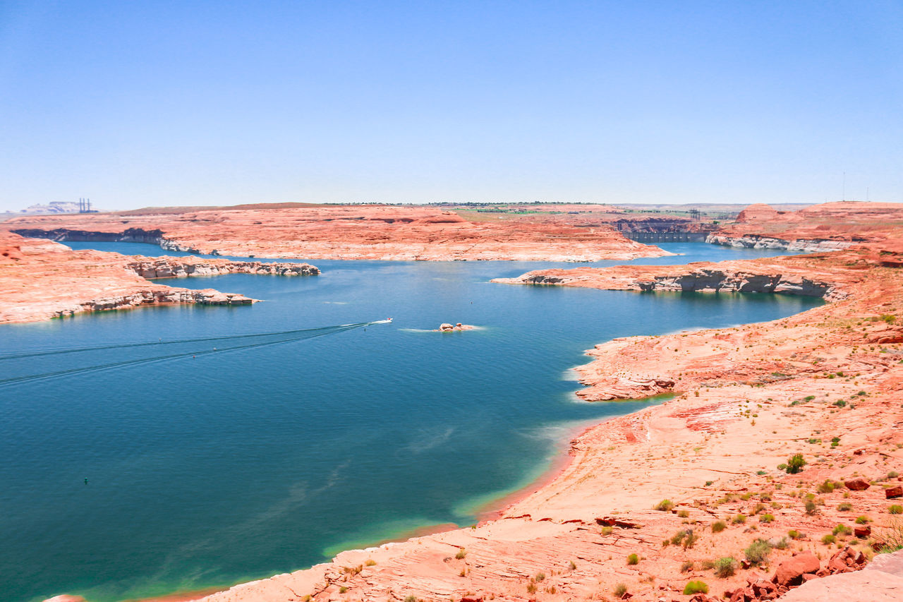 America; area; arizona; blue; boat; canyon; clear; clouds; color; colorado; dam; desert; destination; famous; glen; holiday; lake; landmark; landscape; marina; marine; mountains; nation; national; nature; navajo; orange; outdoor; page; park; powell; recre