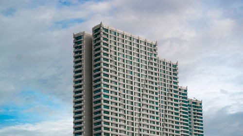 Low angle view of modern building against sky