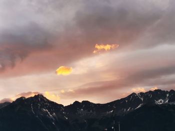 Scenic view of mountains against sky during sunset