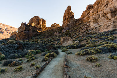 Rock formation on land against sky