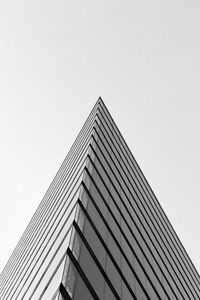 Low angle view of modern building against clear sky