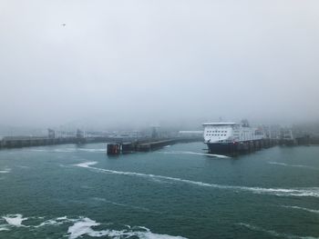 Scenic view of sea against sky during winter