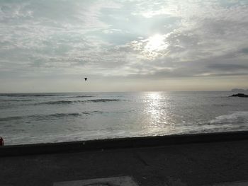 Scenic view of sea against sky at sunset