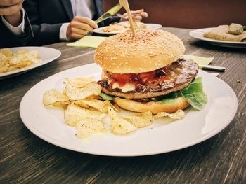 Close-up of burger in plate on table