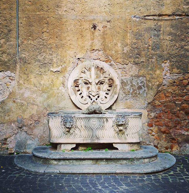 wall - building feature, old, text, close-up, built structure, art and craft, metal, wall, architecture, communication, art, time, number, carving - craft product, clock, brick wall, no people, weathered, old-fashioned, day