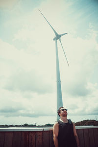 Low angle view of man against sky