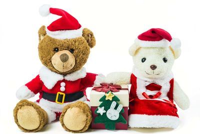 Christmas decoration with toys against white background