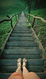 Low section of person standing on steps