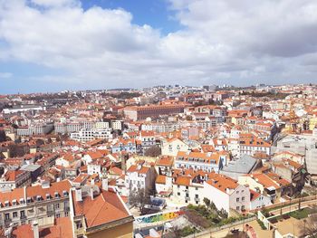 High angle view of residential district against sky