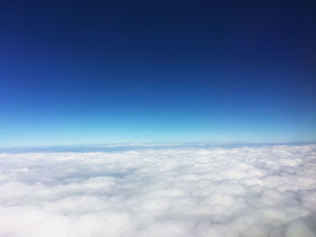 Aerial view of cloudscape against blue sky