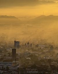 High angle view of city at sunrise