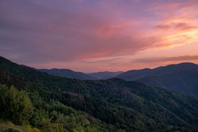 Scenic view of mountains against sky during sunset